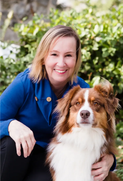 Picture of Dr. Teri with her dog: Australian shepherd.